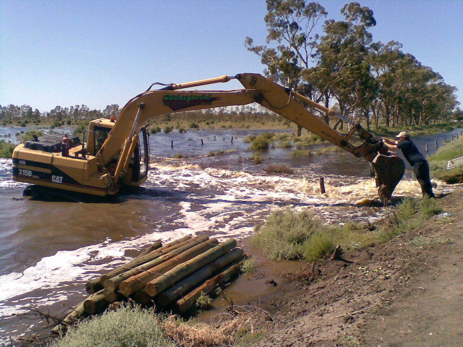 Whitfield Excavations excavator working on waterway project