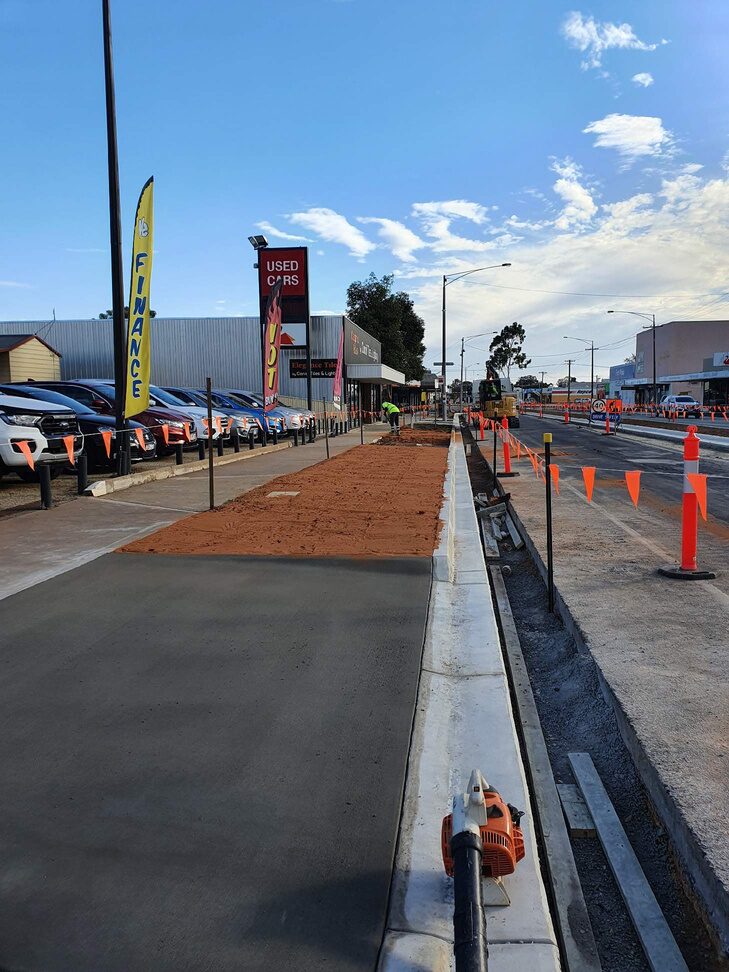 New kerb and channel construction with traffic cones