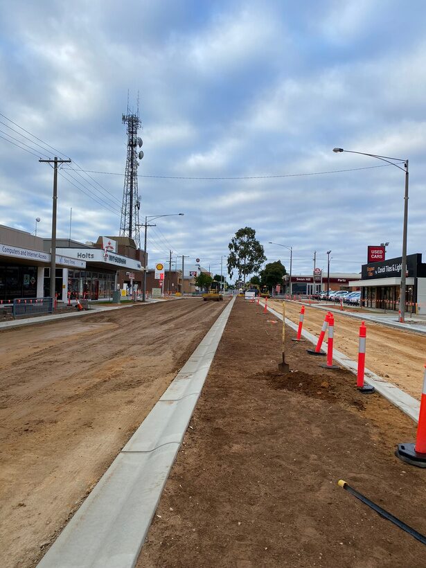 Main street reconstruction with new kerb and traffic control